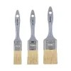 Three flat paint brushes of varying sizes
