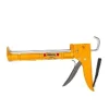Yellow caulking gun isolated on white background