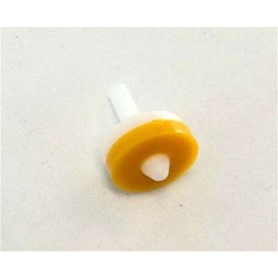 Small yellow and white plastic wall anchor