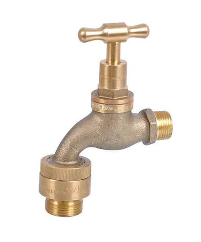 Brass outdoor garden tap on white background